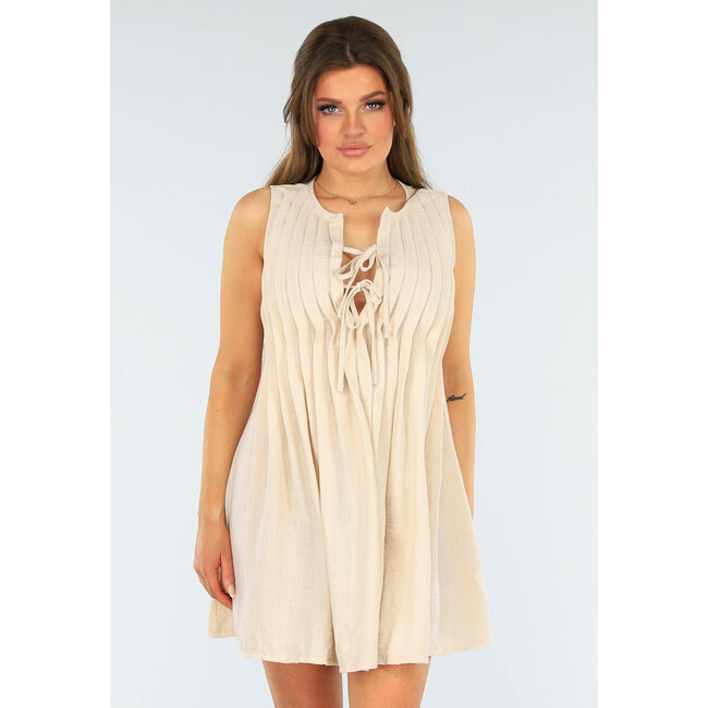 Plissiertes Kleid in Beige mit Schleifenverschluss und lockerer Passform