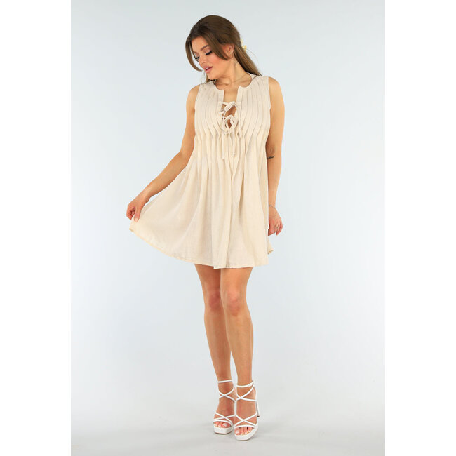 Plissiertes Kleid in Beige mit Schleifenverschluss und lockerer Passform