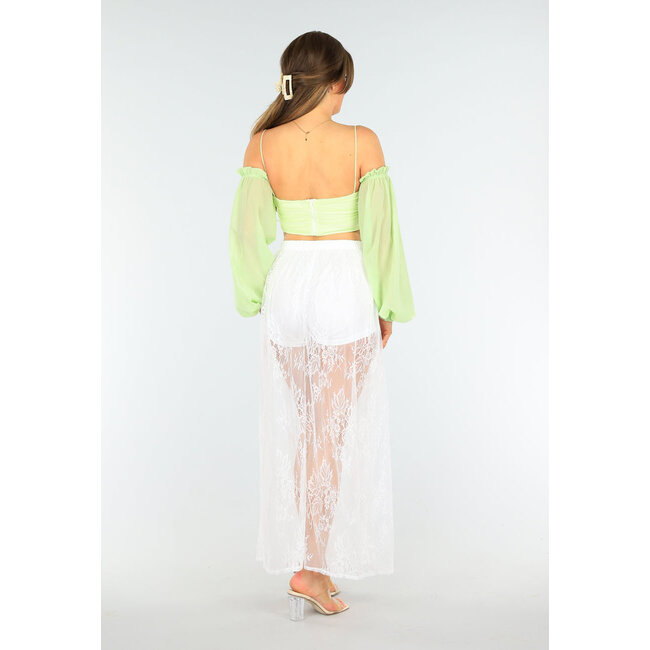 Weißer Spitzen-Maxirock mit eingesetzter Stretch-Hose und Taillenbund