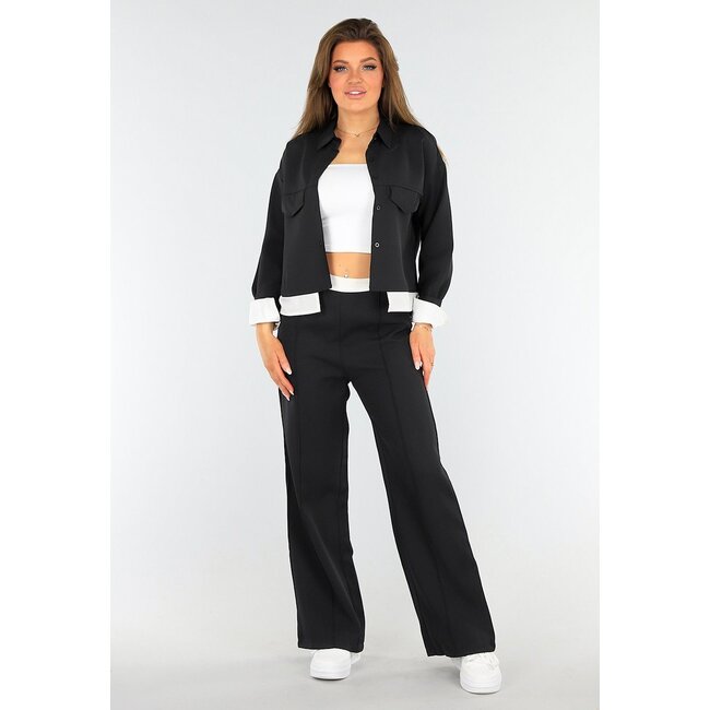 Zweiteiliges Set Schwarz mit Taillenband und Jacke mit Knopfverschluss