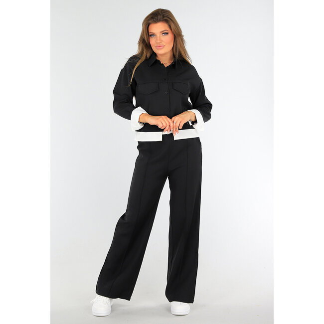 Zweiteiliges Set Schwarz mit Taillenband und Jacke mit Knopfverschluss