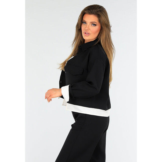 Zweiteiliges Set Schwarz mit Taillenband und Jacke mit Knopfverschluss