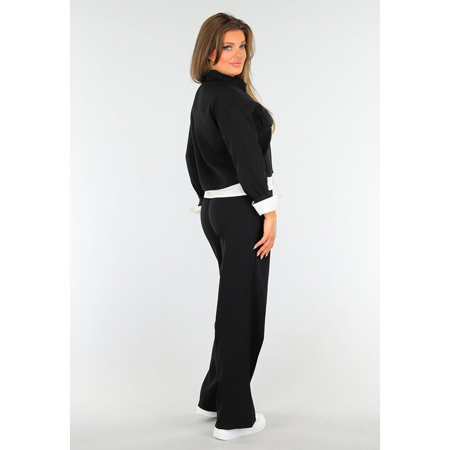 Zweiteiliges Set Schwarz mit Taillenband und Jacke mit Knopfverschluss