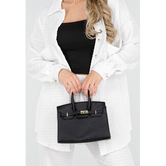Schwarze Handtasche mit goldfarbenem Verschluss