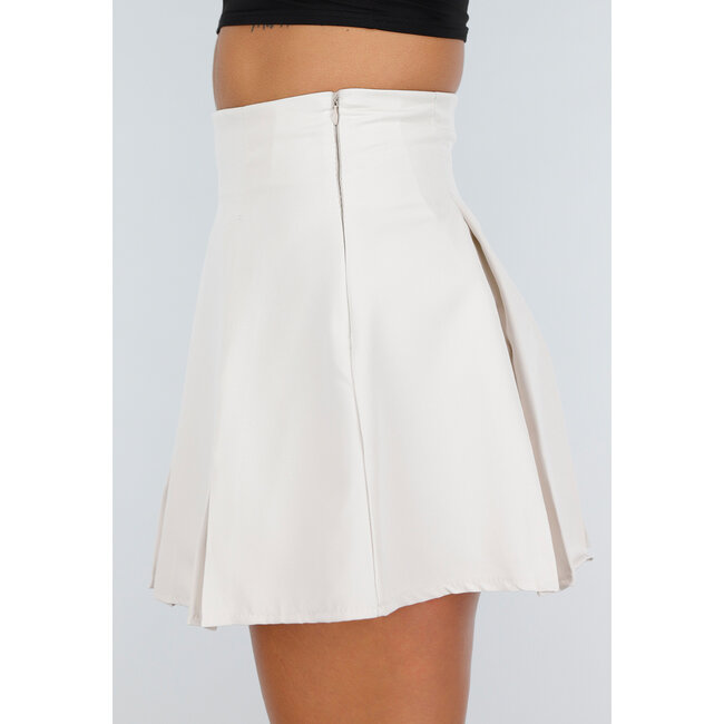 Zweiteiliges Set in Creme mit Korsettblazer und Faltenrock mit Reißverschluss