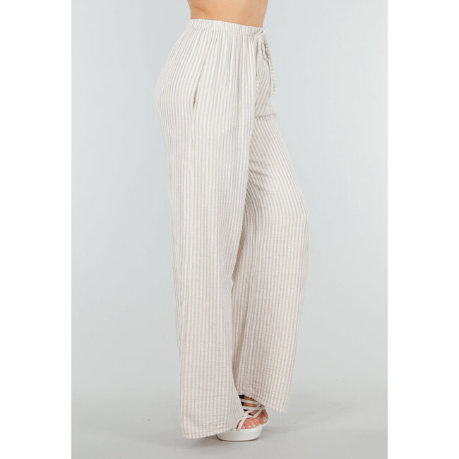 Beige-weiße Hose aus Baumwolle mit vertikalen Streifen und Stretch