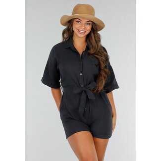 Schwarzer Playsuit mit Taschen und Schleifengürtel