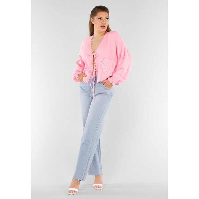 Rosa Bluse mit Herz-Taschen und Knopfleiste