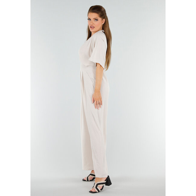 Beigefarbener Jumpsuit in Leinenoptik mit weiten Beinen und tiefem V-Ausschnitt