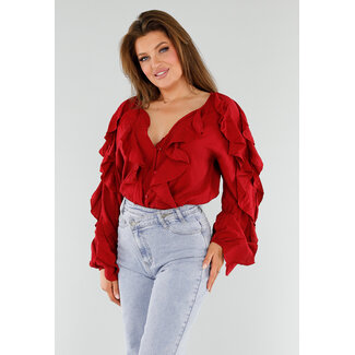 Rote Bluse mit Rüschen