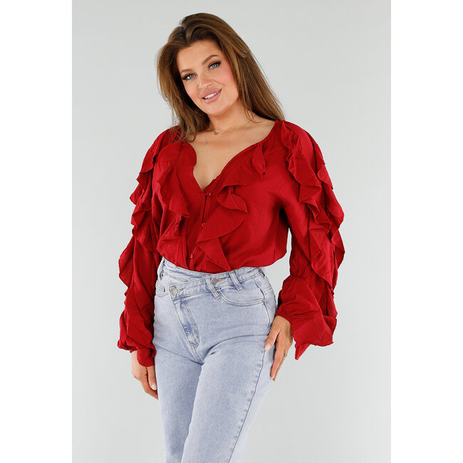 Rote Bluse mit Volants und lockeren Ballonärmeln