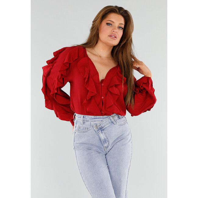 Rote Bluse mit Volants und lockeren Ballonärmeln