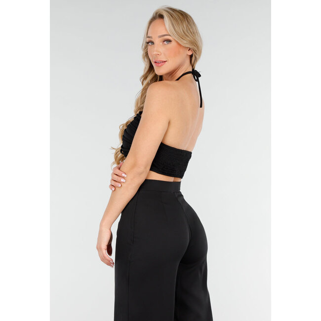 Schwarzes Set mit Neckholder-Crop-Top und weiter Hose mit hoher Taille