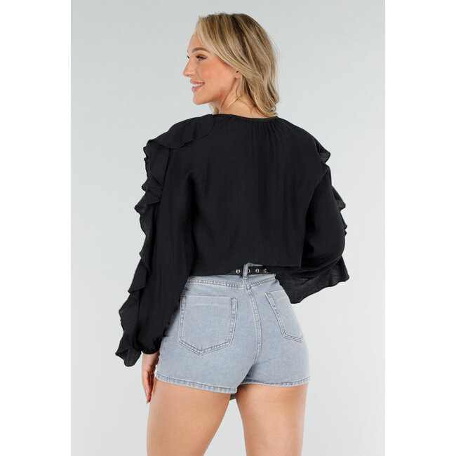 Schwarze langärmelige Bluse mit Rüschen