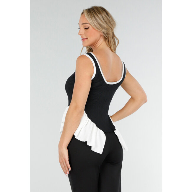 Schwarz-weißes Stretch-Top mit Rundhalsausschnitt und Rüschendetail am Saum