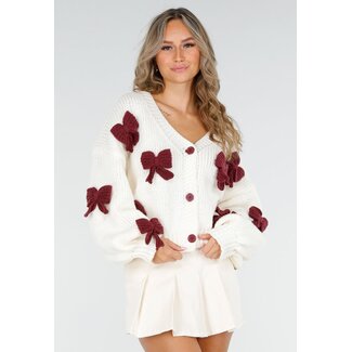Strickjacke mit bordeauxfarbenen Schleifen