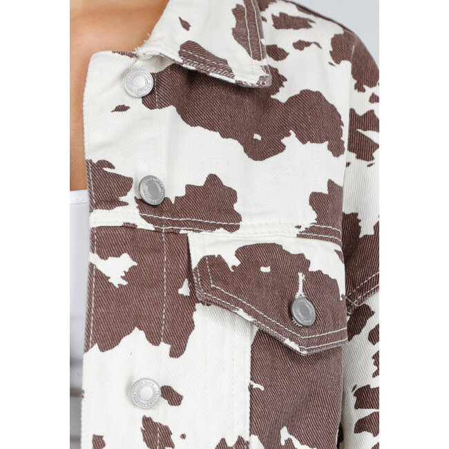 Weiß-braune Denim-Jacke mit durchgehendem Kuhdruck