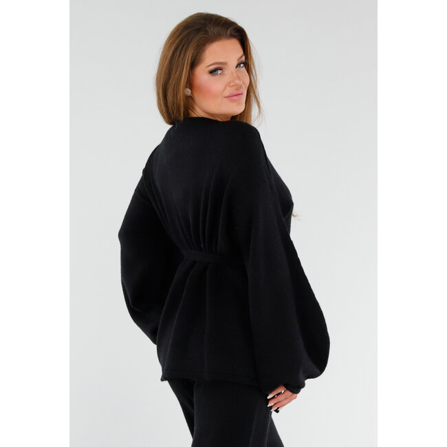 Schwarzes Strickset mit Reversoberteil und weiter Hose