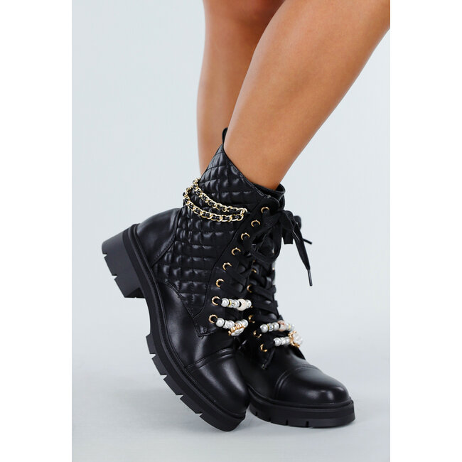 Schwarz gesteppte Veteranenstiefel