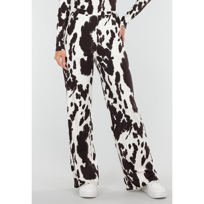 Braun-weiße Stretch-Hose mit Kuh-Print und geraden Beinen