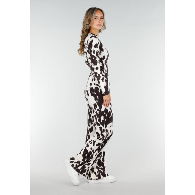 Braun-weiße Stretch-Hose mit Kuh-Print und geraden Beinen