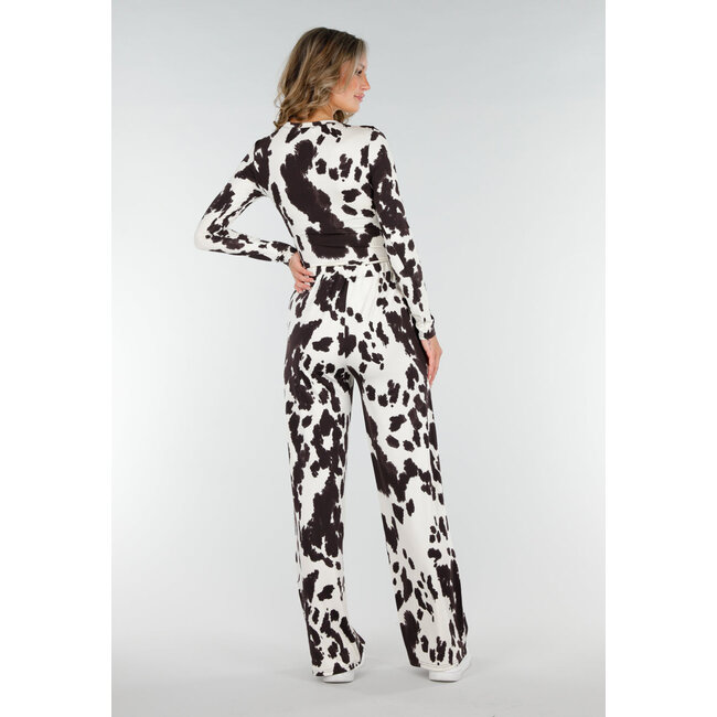 Braun-weiße Stretch-Hose mit Kuh-Print und geraden Beinen