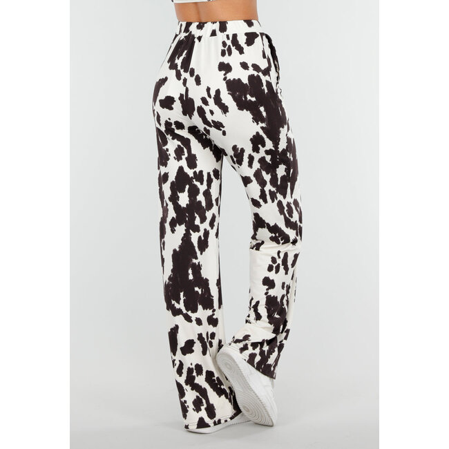Braun-weiße Stretch-Hose mit Kuh-Print und geraden Beinen