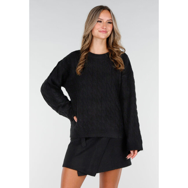 Schwarzer Strickpullover mit langen Ärmeln und Rundhalsausschnitt