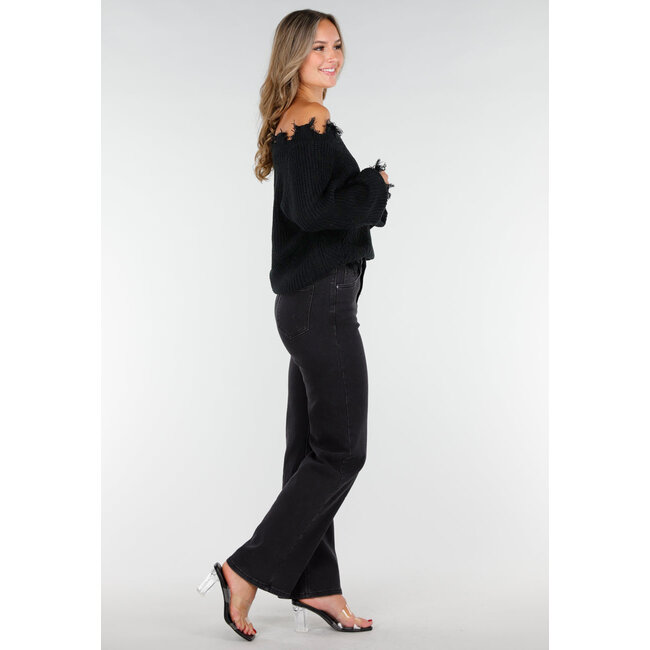 Schwarzer Off-Shoulder Pullover mit Fransen