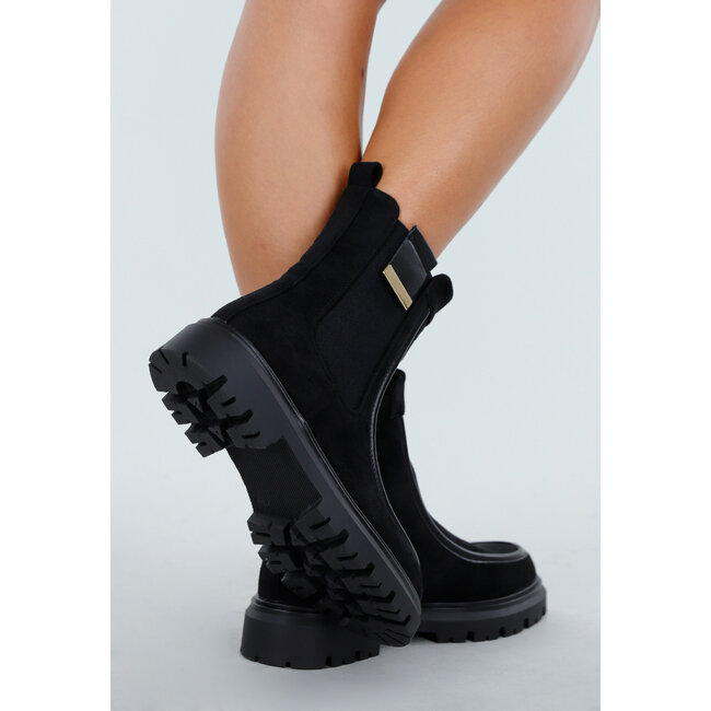 Schwarze Stiefeletten mit klobiger Sohle und Wildlederoptik