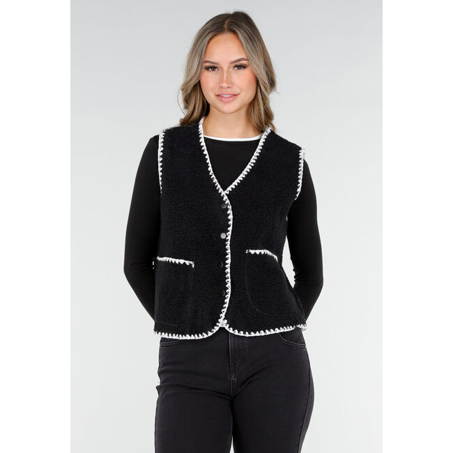 Schwarzes Teddy-Gilet mit weißen Rändern und Knopfverschluss