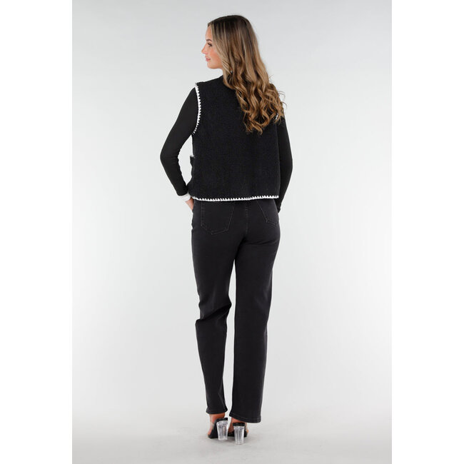 Schwarzes Teddy-Gilet mit weißen Rändern und Knopfverschluss