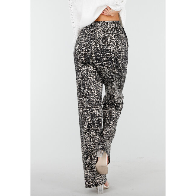 Schwarze weite Hose mit abstraktem Print
