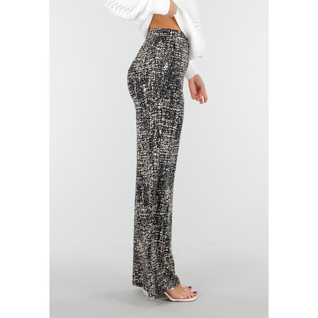 Schwarze weite Hose mit abstraktem Print