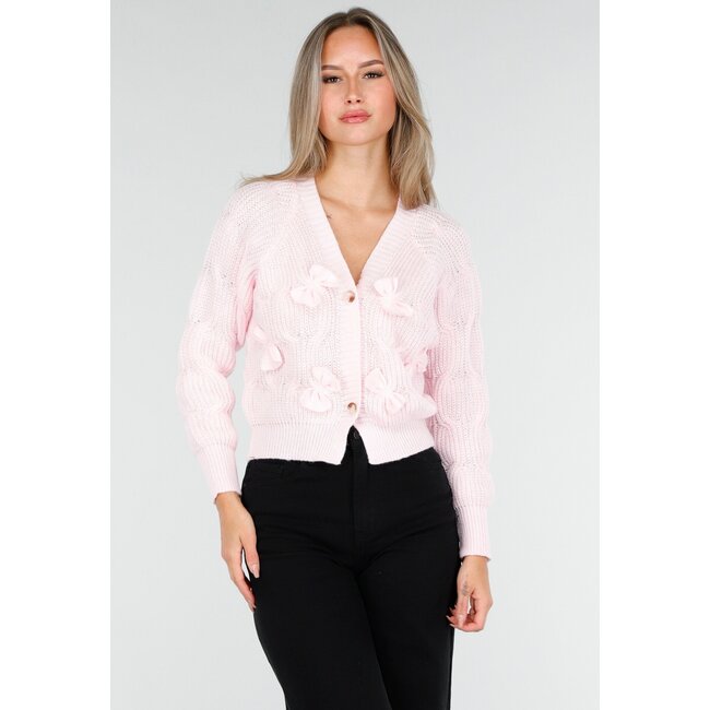 Rosa Strickjacke mit Schleifendetails und Knöpfen