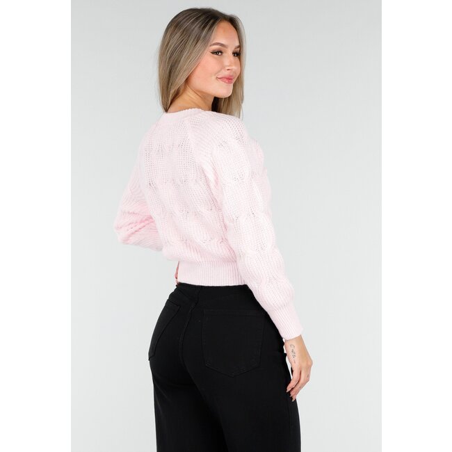 Rosa Strickjacke mit Schleifendetails und Knöpfen