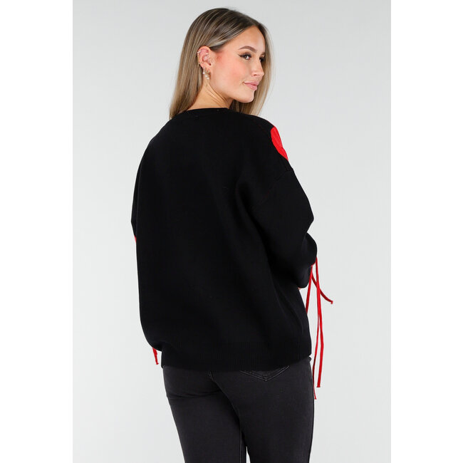 Schwarzes Sweatshirt mit rotem Herzprint und Fransen