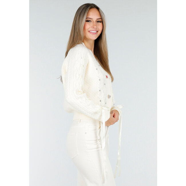 Cremefarbene Strickjacke mit Perlen- und Schleifendetails