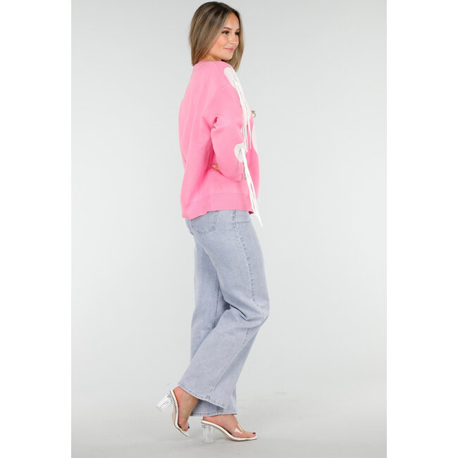 Rosa Pullover mit weißem Herzprint und Fransen