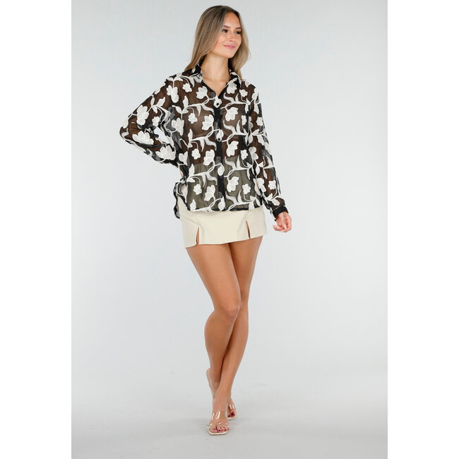 Schwarze transparente Bluse mit beiger Blumenstickerei und langen Ärmeln