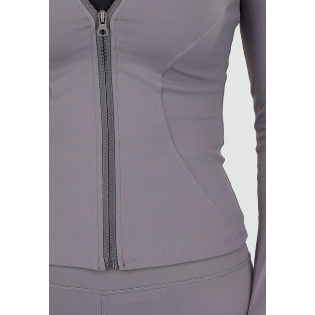 Graues Stretch-Sportset mit engen Leggings und Weste