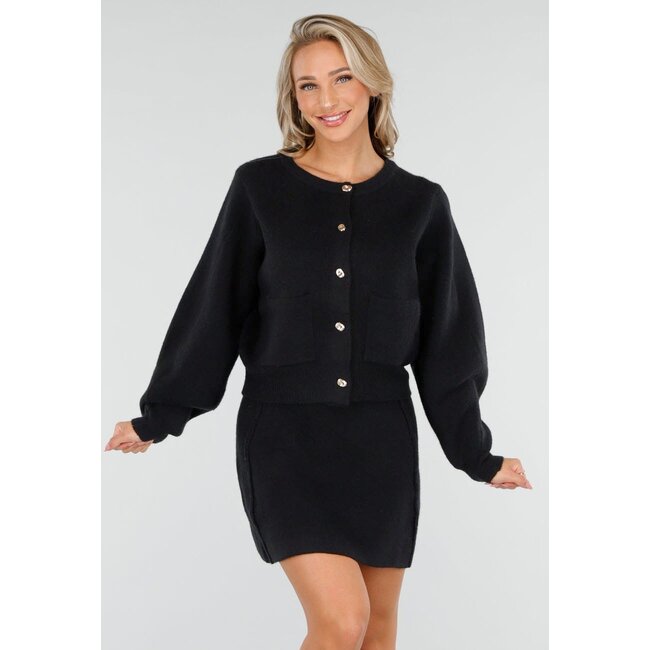 Schwarzes Strick-2-teiliges Set mit Weste und Rock