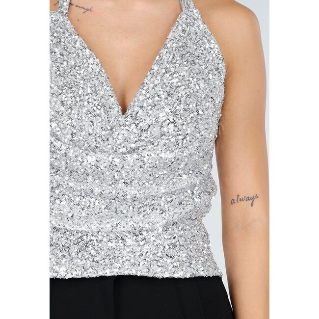 Silbernes Neckholder-Top mit Glitzer und offenem Rücken
