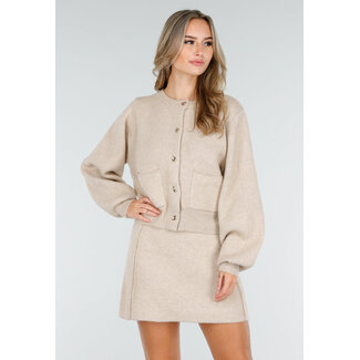 Beigefarbenes gestricktes zweiteiliges Set