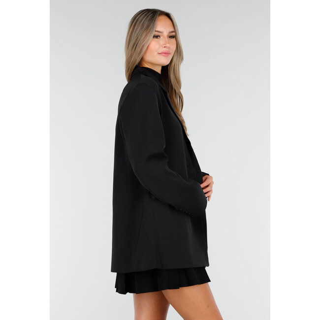 Schwarzer Oversized-Blazer mit Knopfverschluss und Reverskragen