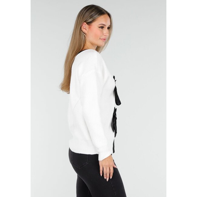 Weißer Cardigan mit schwarzen Schleifen und langen Ärmeln