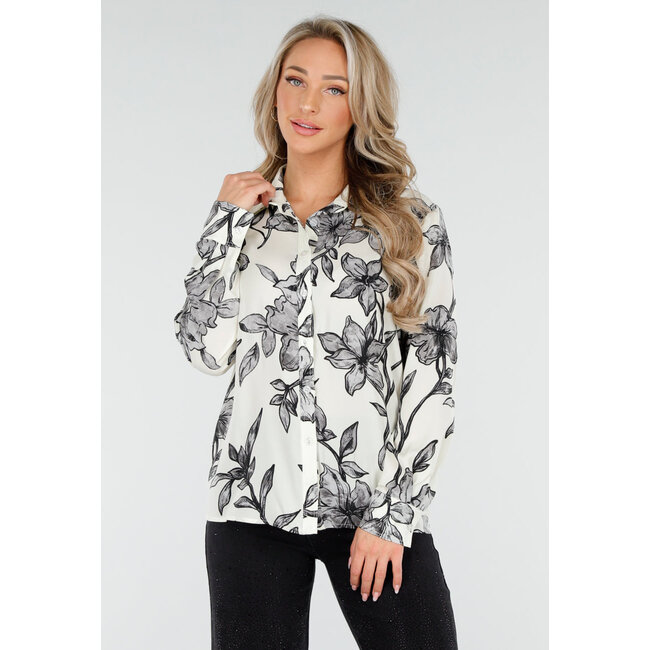 Weiße Bluse mit schwarzem Blumenmuster und langen Ärmeln