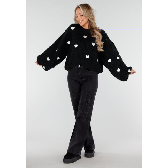 Schwarze Sneakers mit Fellfutter und dicker Plateausohle mit Schnürsenkeln und Reißverschluss