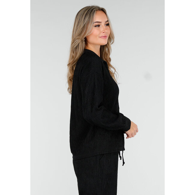 Schwarzes Stretch-Zweiteiler-Set mit locker fallender Bluse und gerader Hose