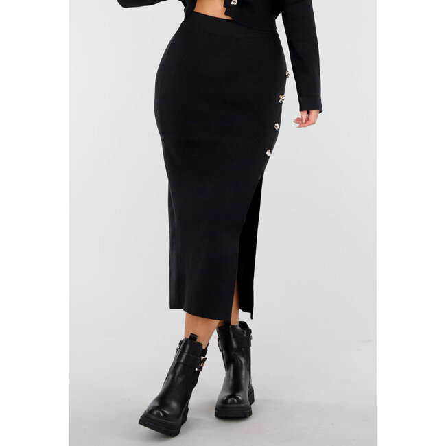 Schwarzes Strick-Set mit Midirock mit Schlitz